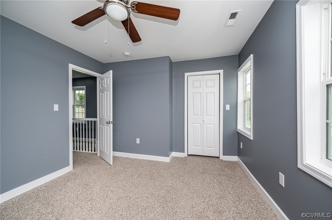706 Rome Street Petersburg, VA 23803 - Photo 23 of 26 a view of an empty room with a window