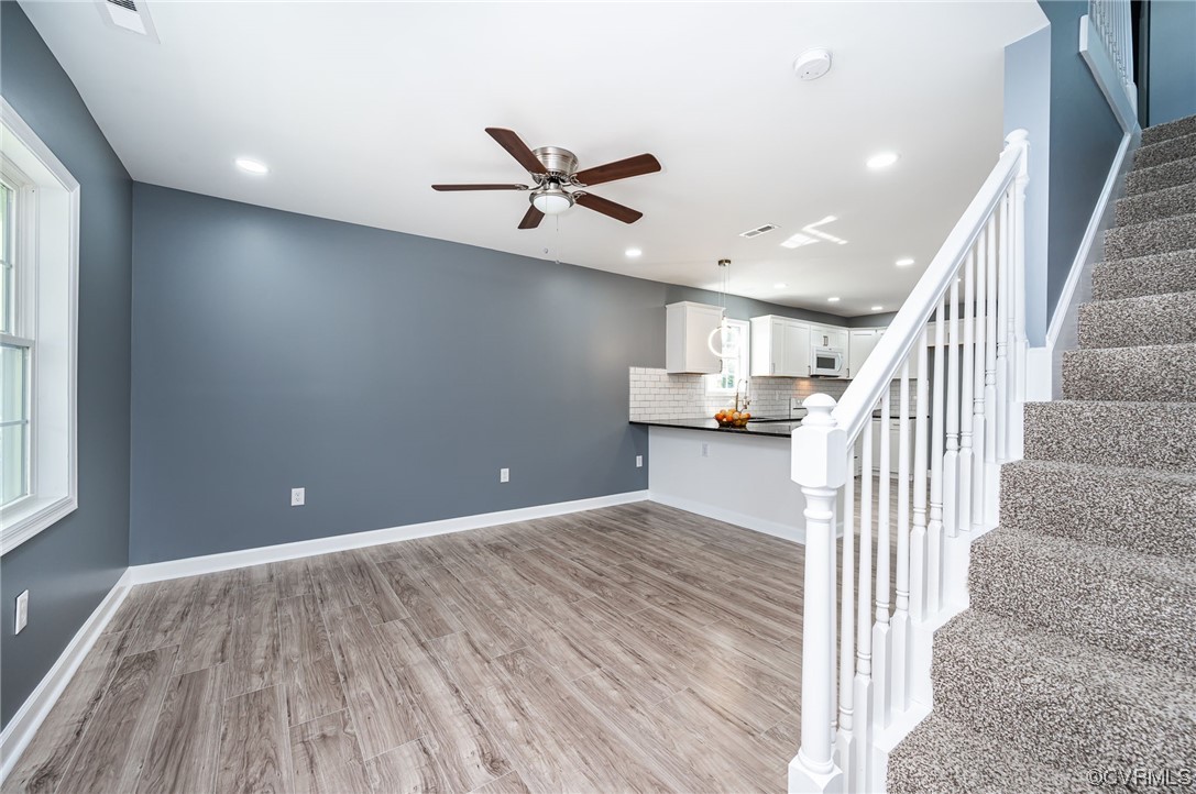 706 Rome Street Petersburg, VA 23803 - Photo 3 of 26 a view of entryway and hall with wooden floor