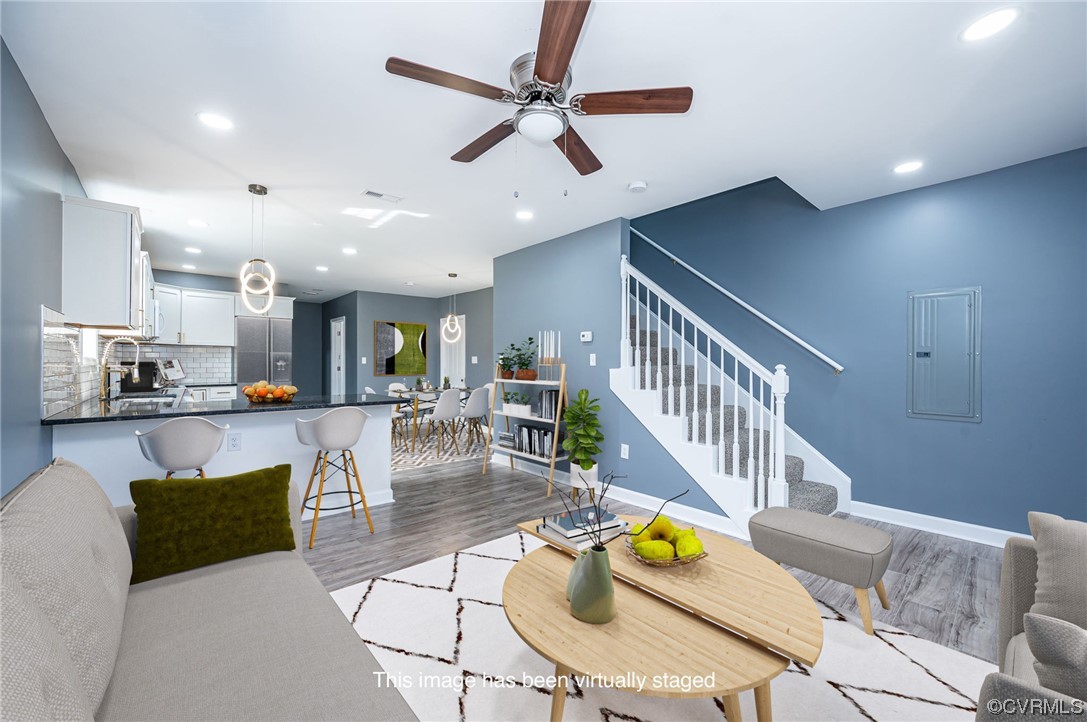 706 Rome Street Petersburg, VA 23803 - Photo 4 of 26 a living room with furniture and kitchen view
