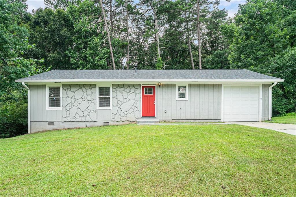 4333 Denise Drive Decatur, GA 30035 - Photo 1 of 1 front view of a house with a big yard