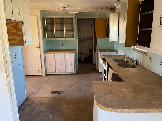 a bathroom with a tub and a sink