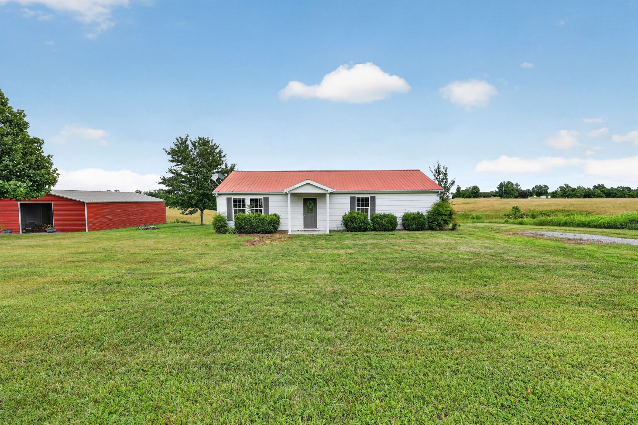 120 Driver Road Lafayette, TN 37083 - Photo 3 of 39 a front view of house with yard and trees