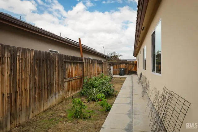 a view of a garden with pathway