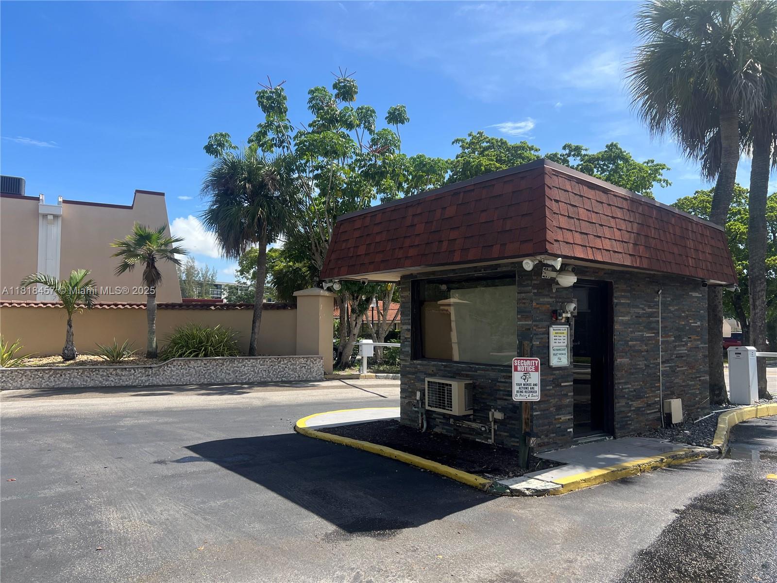 a view of a house with sitting area and a yard