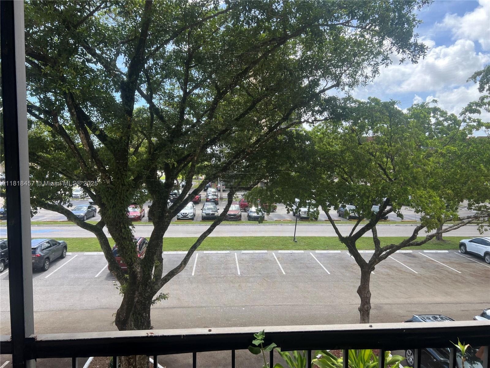 4156 Inverrary Drive, Unit 309 Lauderhill, FL 33319 - Photo 8 of 16 a view of outdoor space with garden