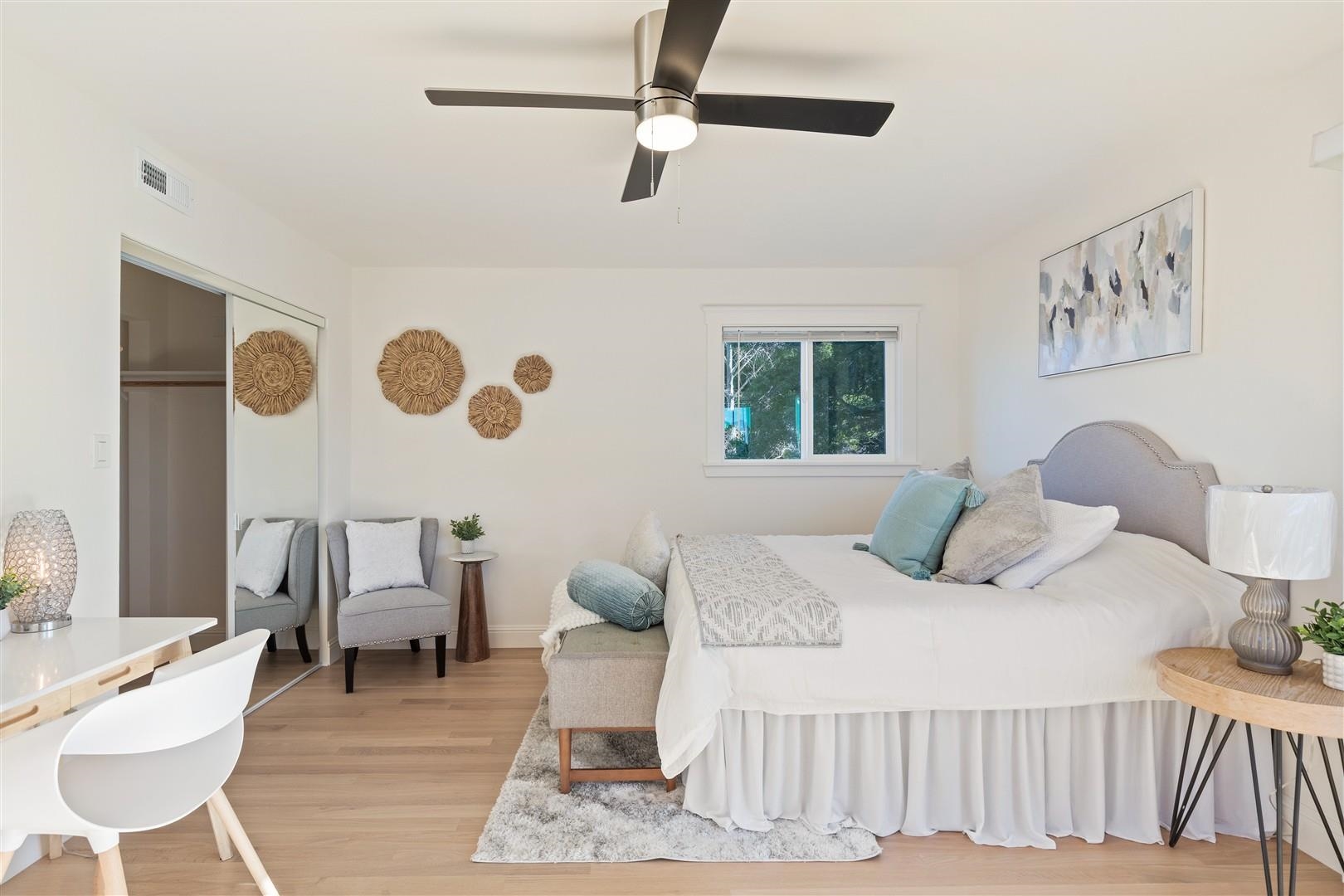 1524 Blake Street Berkeley, CA 94703 - Photo 18 of 59 Bedroom with ceiling fan, light wood finished floors, and a closet