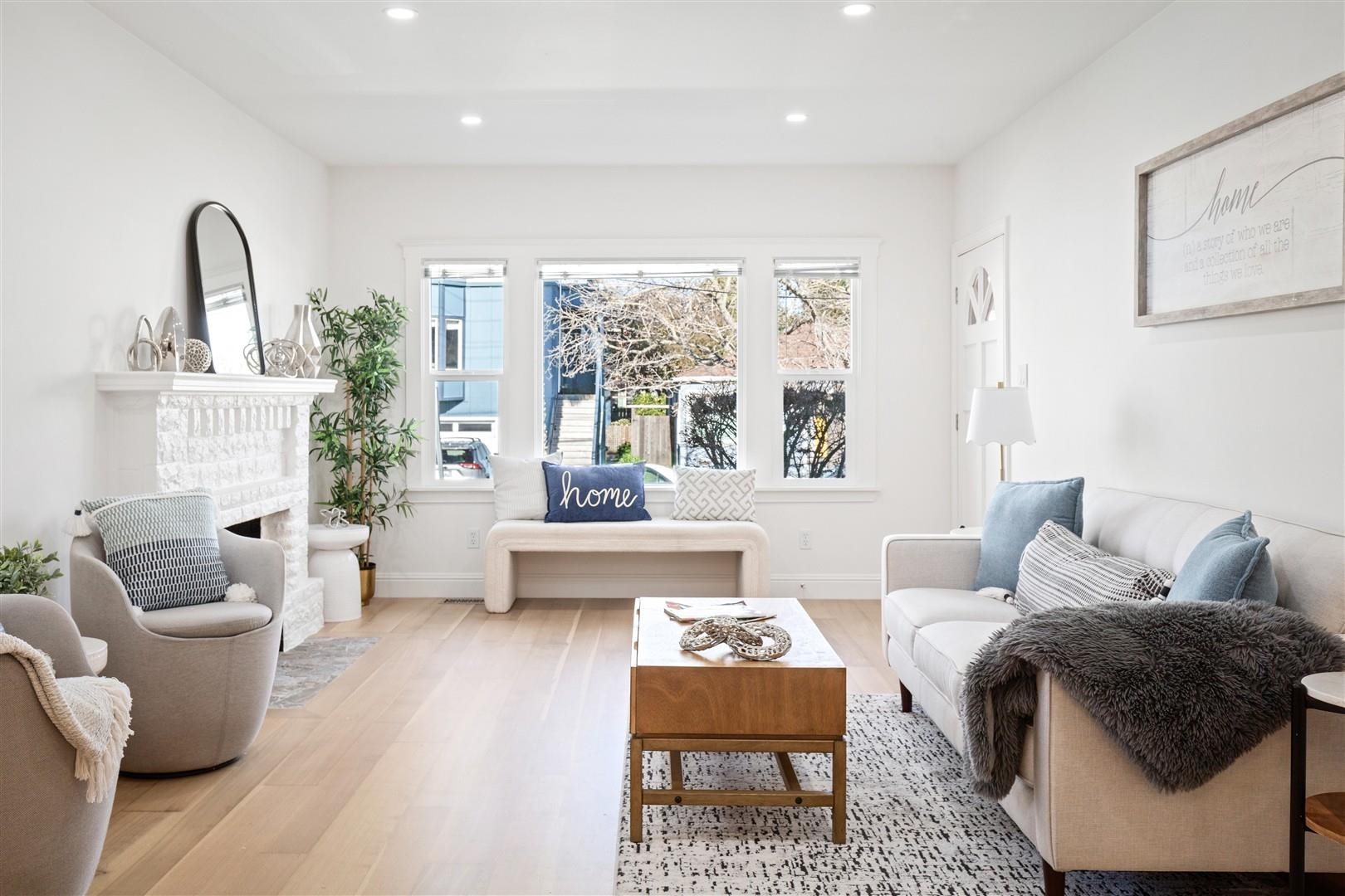 1524 Blake Street Berkeley, CA 94703 - Photo 41 of 59 Living area with wood finished floors, recessed lighting, and a brick fireplace