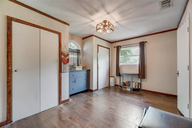a view of a storage & utility room with a window
