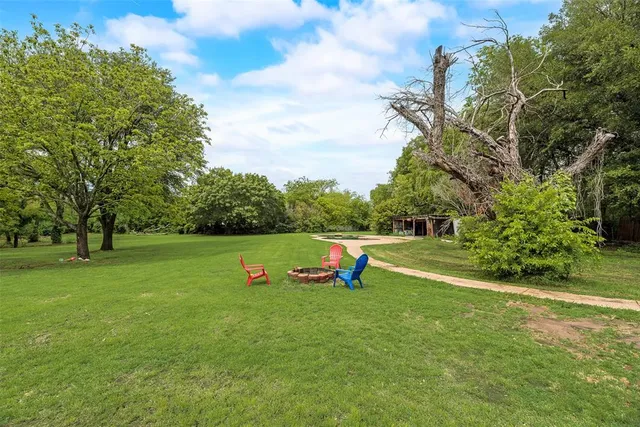 a view of a golf course with a park