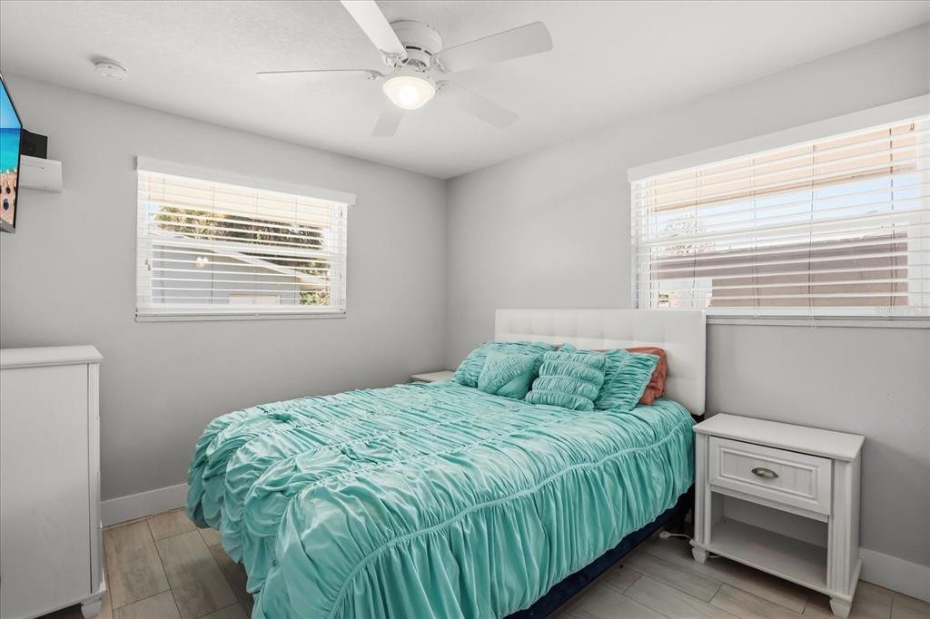 159 Holland Road Ormond Beach, FL 32176 - Photo 14 of 55 a bedroom with a bed and a window