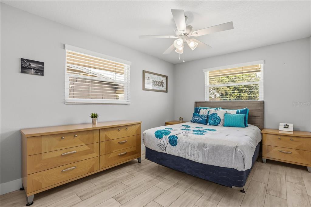 159 Holland Road Ormond Beach, FL 32176 - Photo 24 of 55 a bedroom with a bed and window