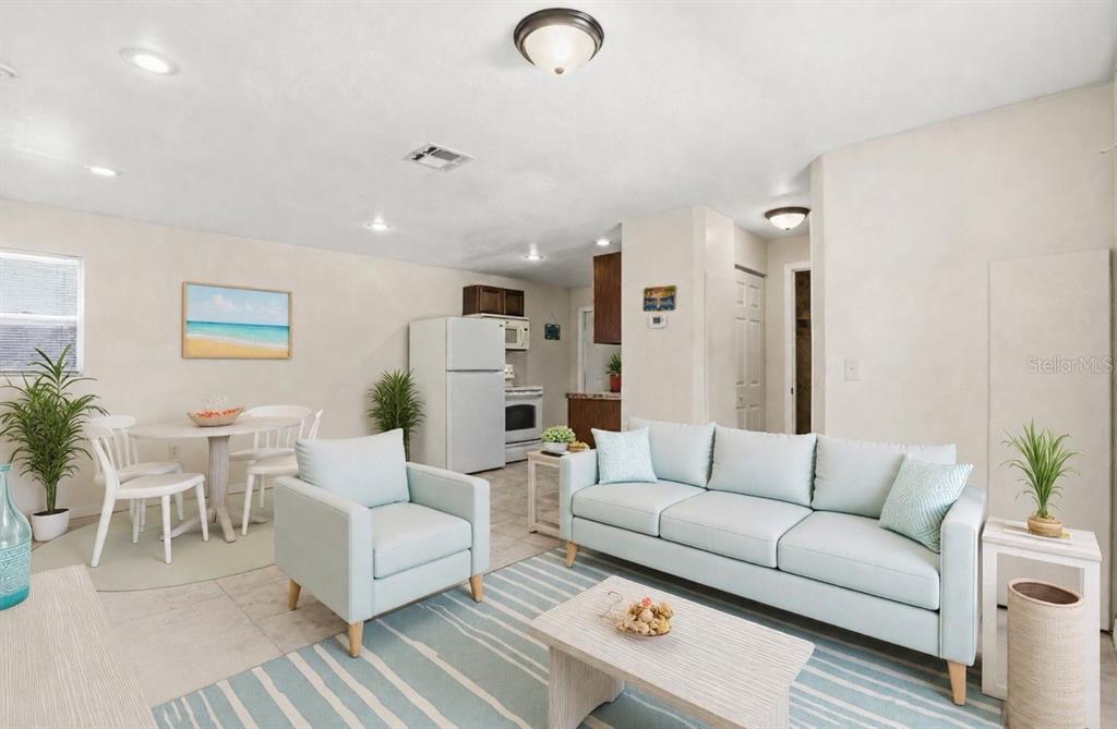 159 Holland Road Ormond Beach, FL 32176 - Photo 34 of 55 a living room with furniture and a couch