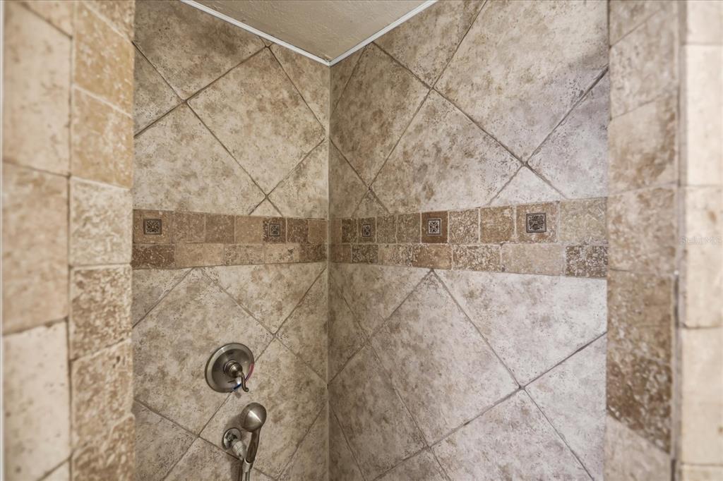 159 Holland Road Ormond Beach, FL 32176 - Photo 36 of 55 a bathroom with a shower