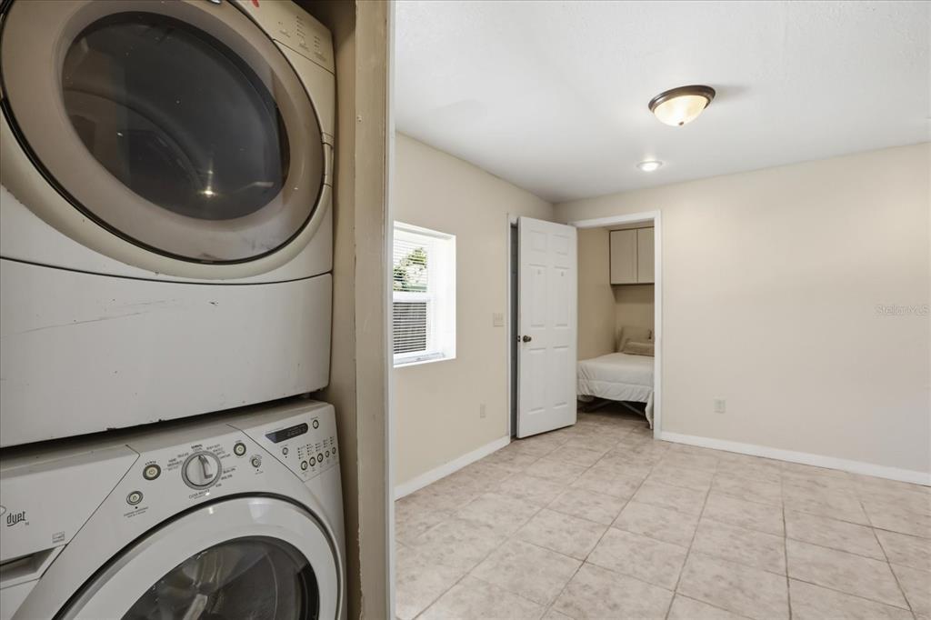 159 Holland Road Ormond Beach, FL 32176 - Photo 39 of 55 a utility room with dryer and washer