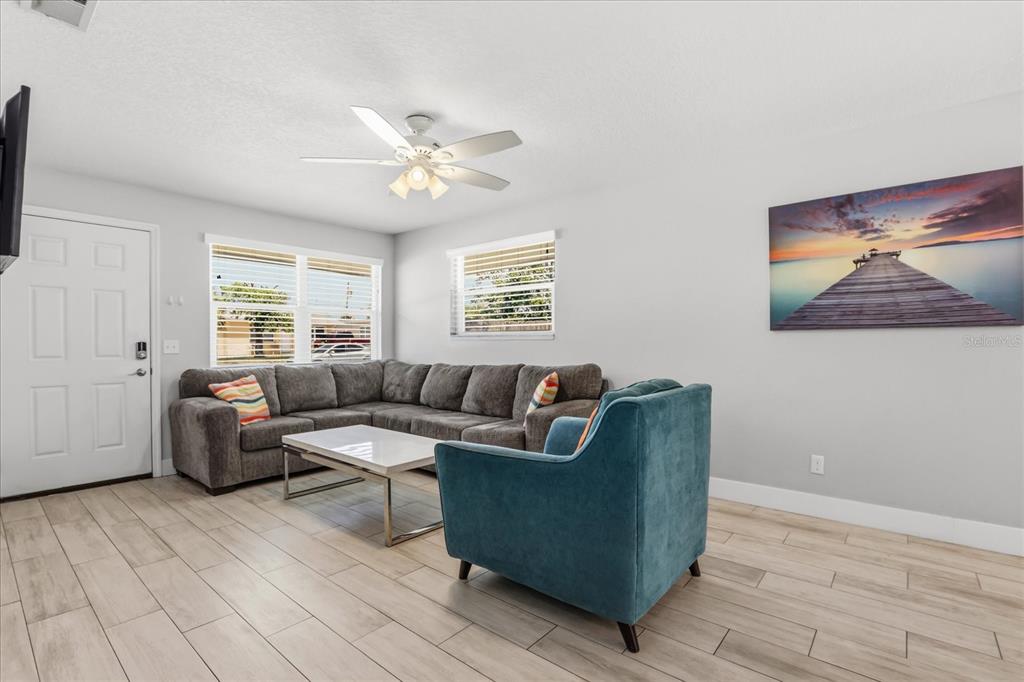 159 Holland Road Ormond Beach, FL 32176 - Photo 6 of 55 a living room with furniture and a window