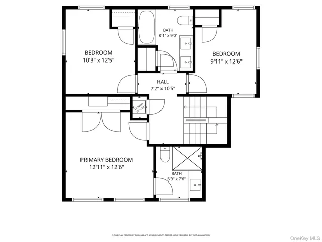 a picture of a bench in front of a wall