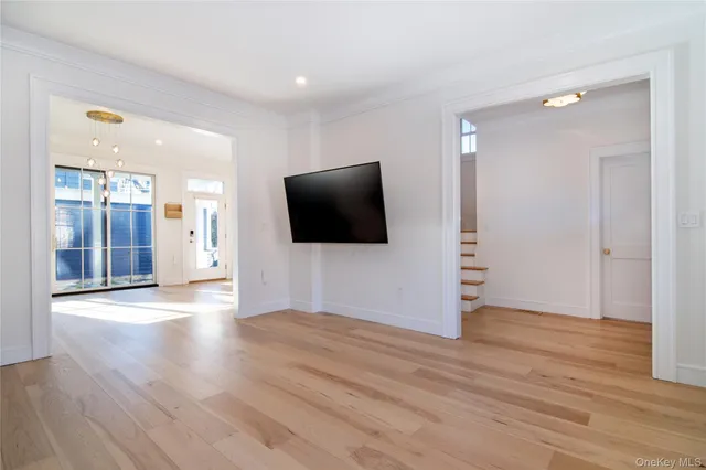 a view of a livingroom with wooden floor