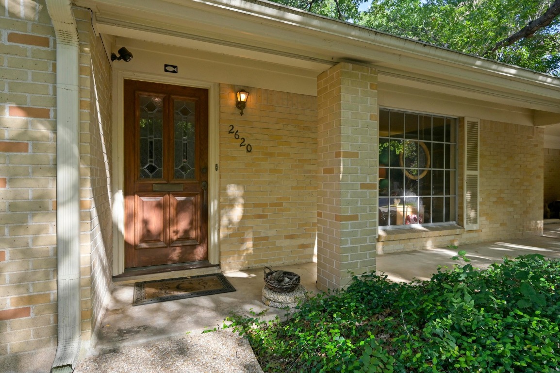 2620 Pecos Street Austin, TX 78703 - Photo 1 of 1 a view of a door of a house with an outdoor space