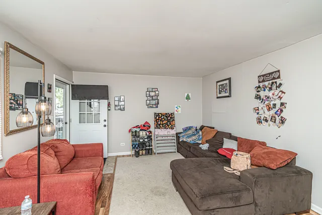 a living room with furniture and a couch