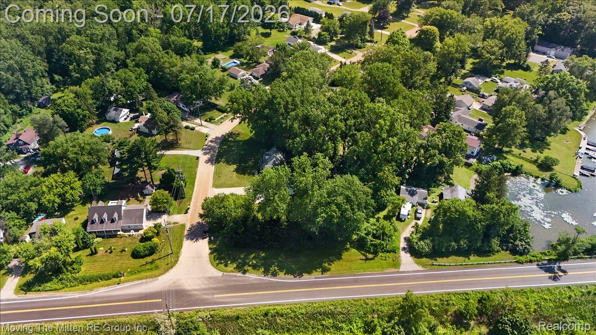 40162 Alden Road Belleville, MI 48111 - Photo 60 of 67 Aerial perspective showcasing a residential area with mature trees