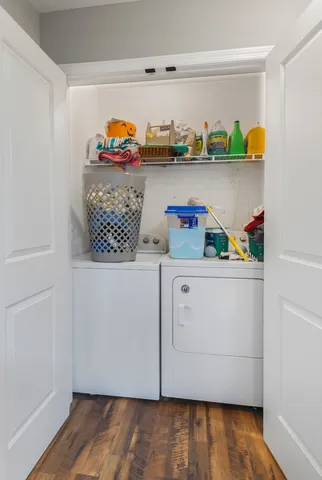 a view of cabinets with wooden floor