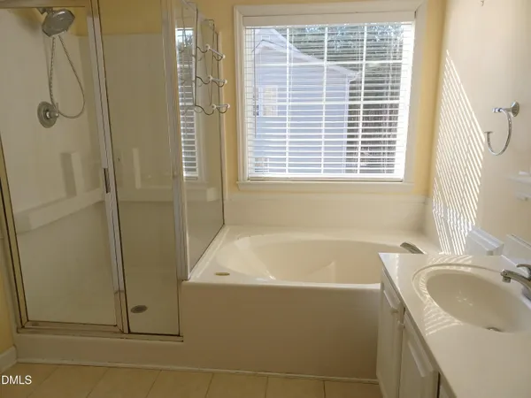 a view of an empty room with stairs