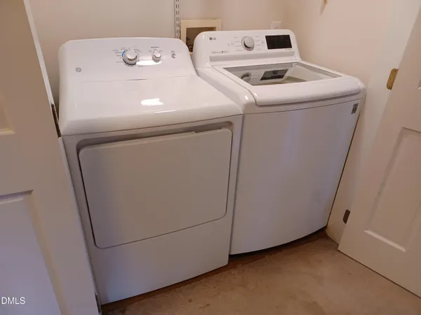 a view of livingroom with furniture and window