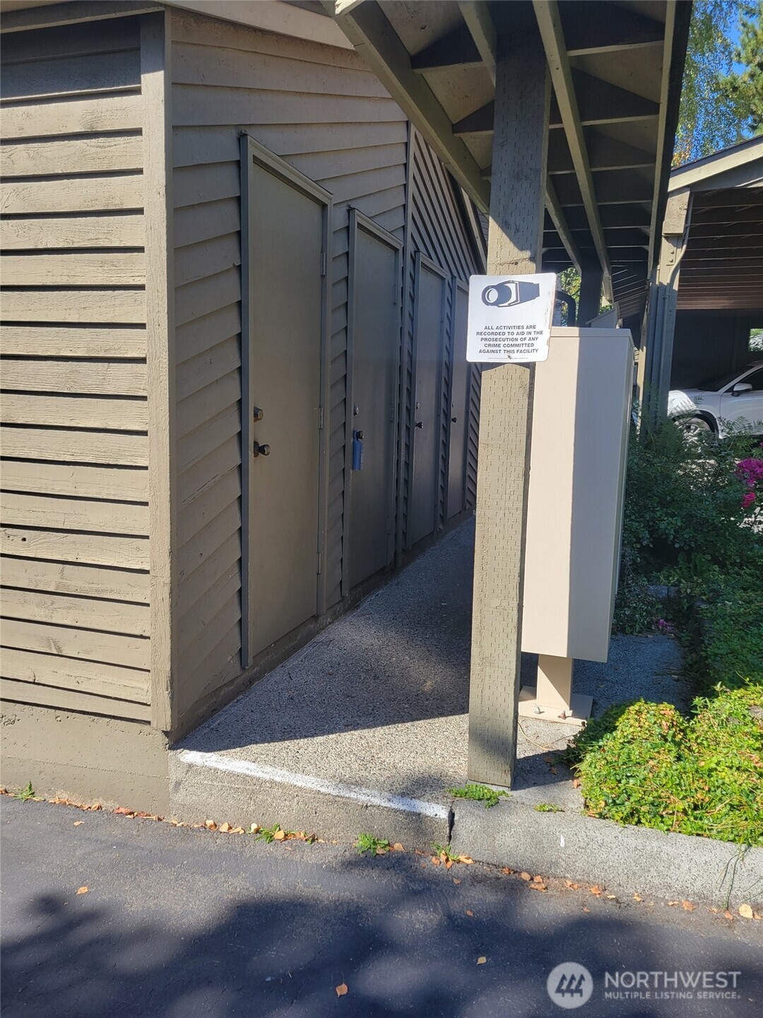134 Southwest 116th Street, Unit H21 Seattle, WA 98146 - Photo 16 of 16 a view of a garage