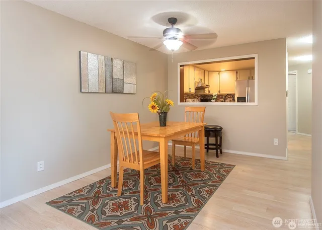 a view of a dining room with furniture