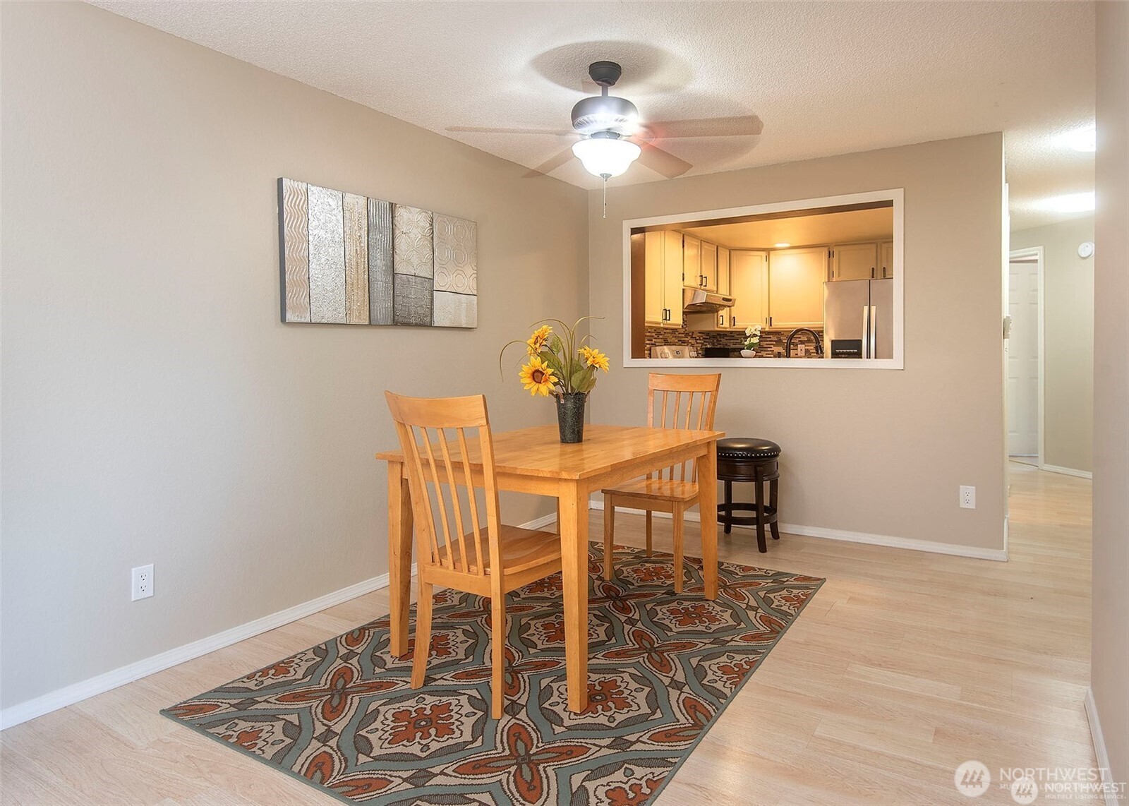 134 Southwest 116th Street, Unit H21 Seattle, WA 98146 - Photo 7 of 16 a view of a dining room with furniture