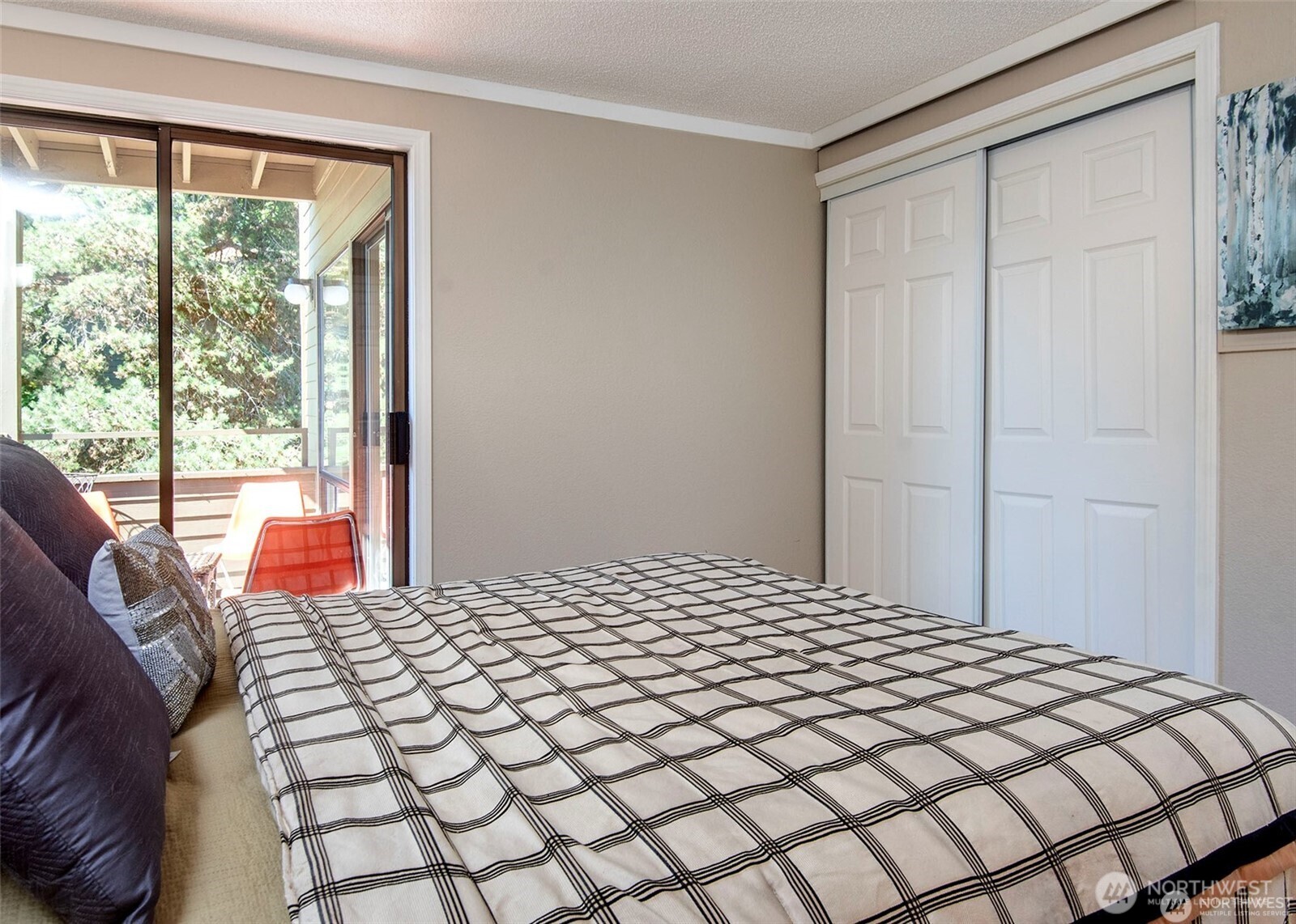 134 Southwest 116th Street, Unit H21 Seattle, WA 98146 - Photo 9 of 16 a bedroom with a bed and a lamp next to a window