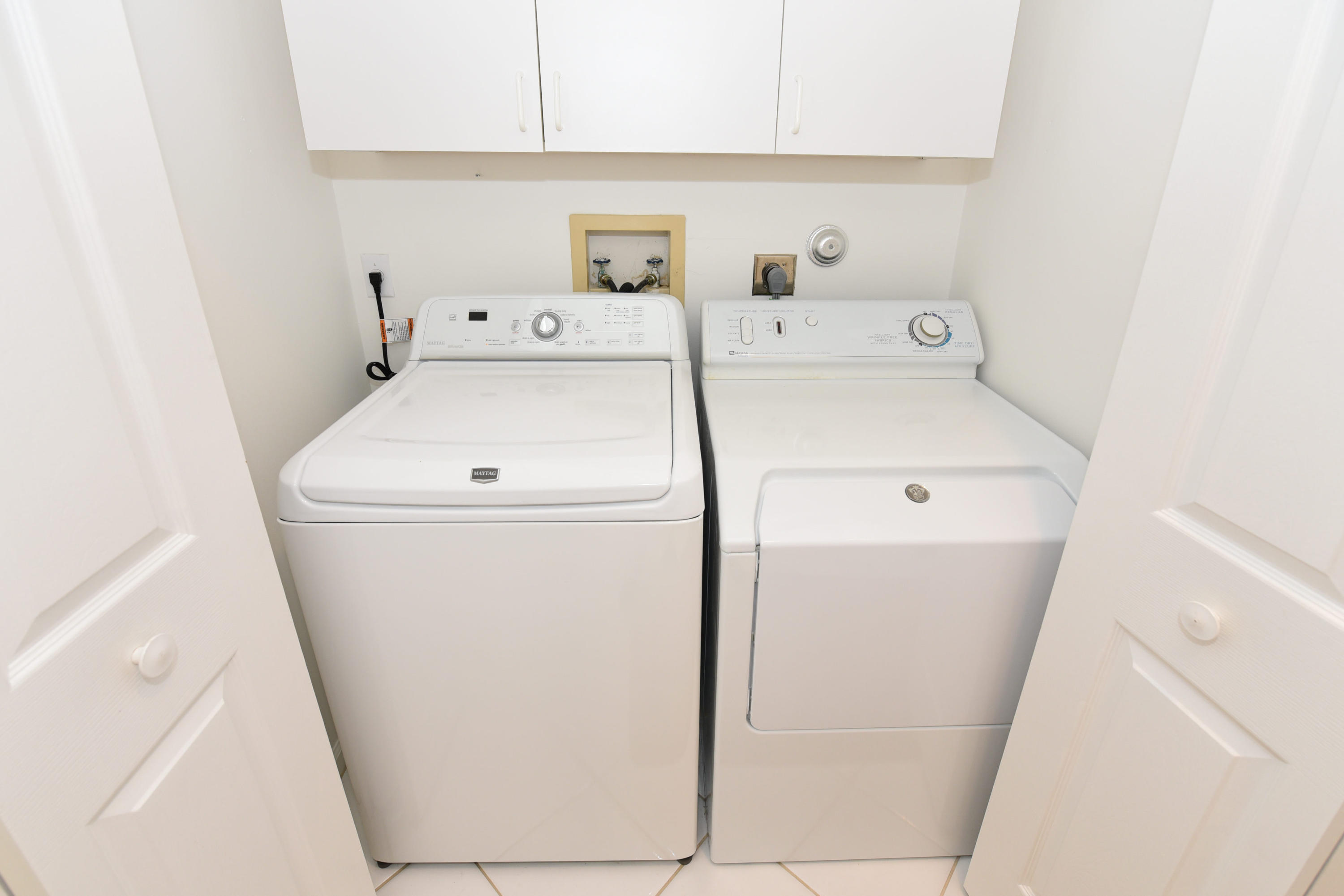 23358 Torre Circle Boca Raton, FL 33433 - Photo 17 of 34 a utility room with dryer and washer