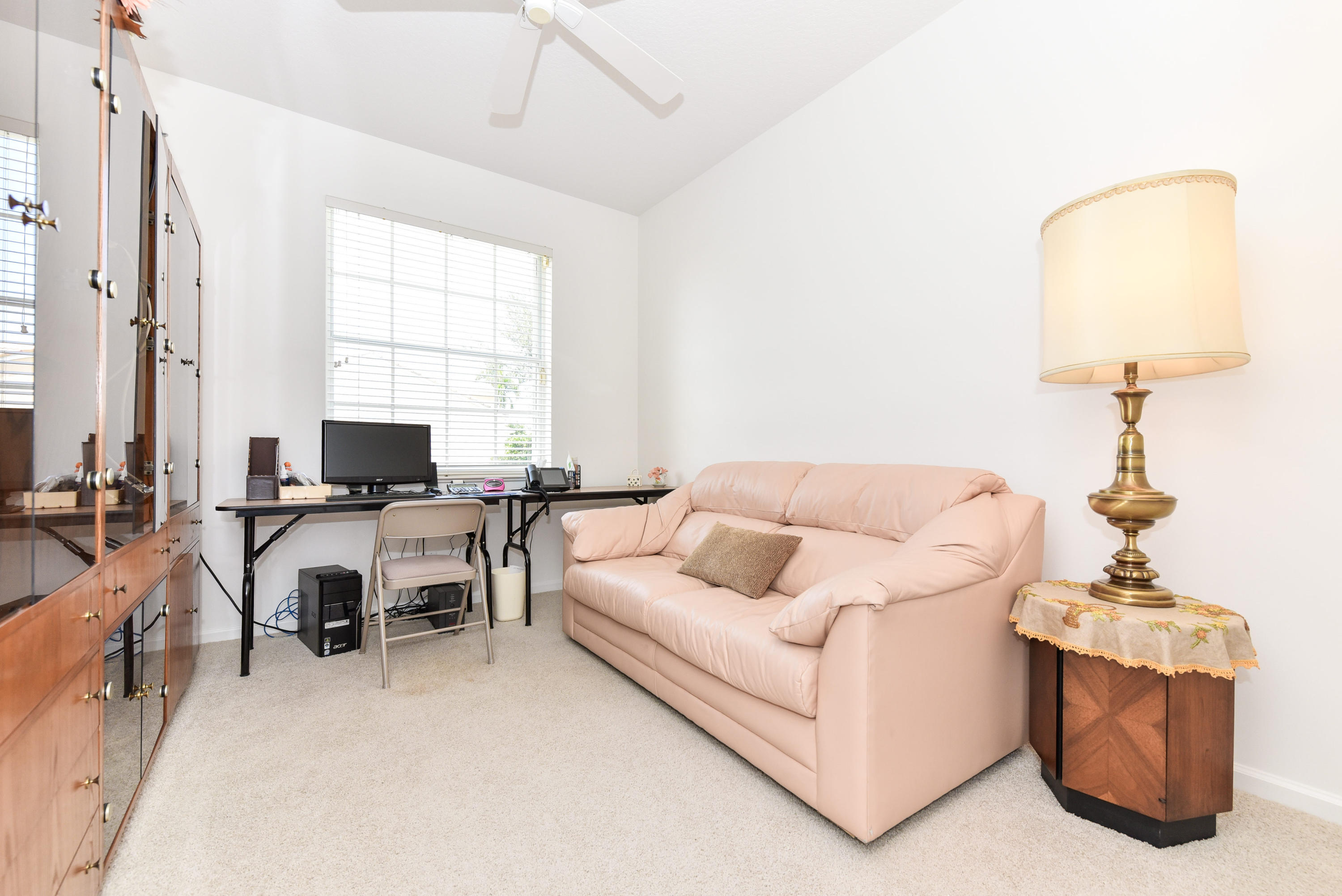 23358 Torre Circle Boca Raton, FL 33433 - Photo 19 of 34 a living room with furniture and a window
