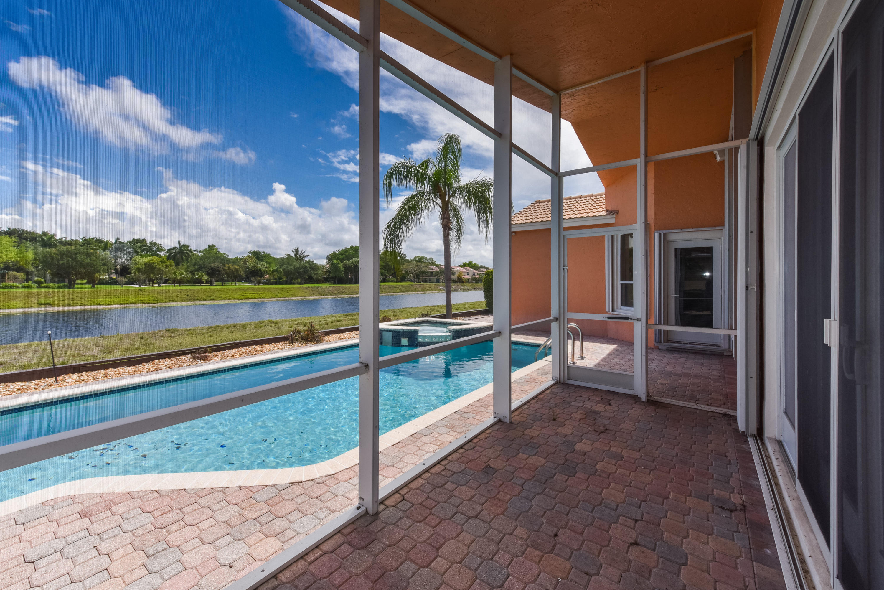 23358 Torre Circle Boca Raton, FL 33433 - Photo 32 of 34 a view of swimming pool with a lounge chair