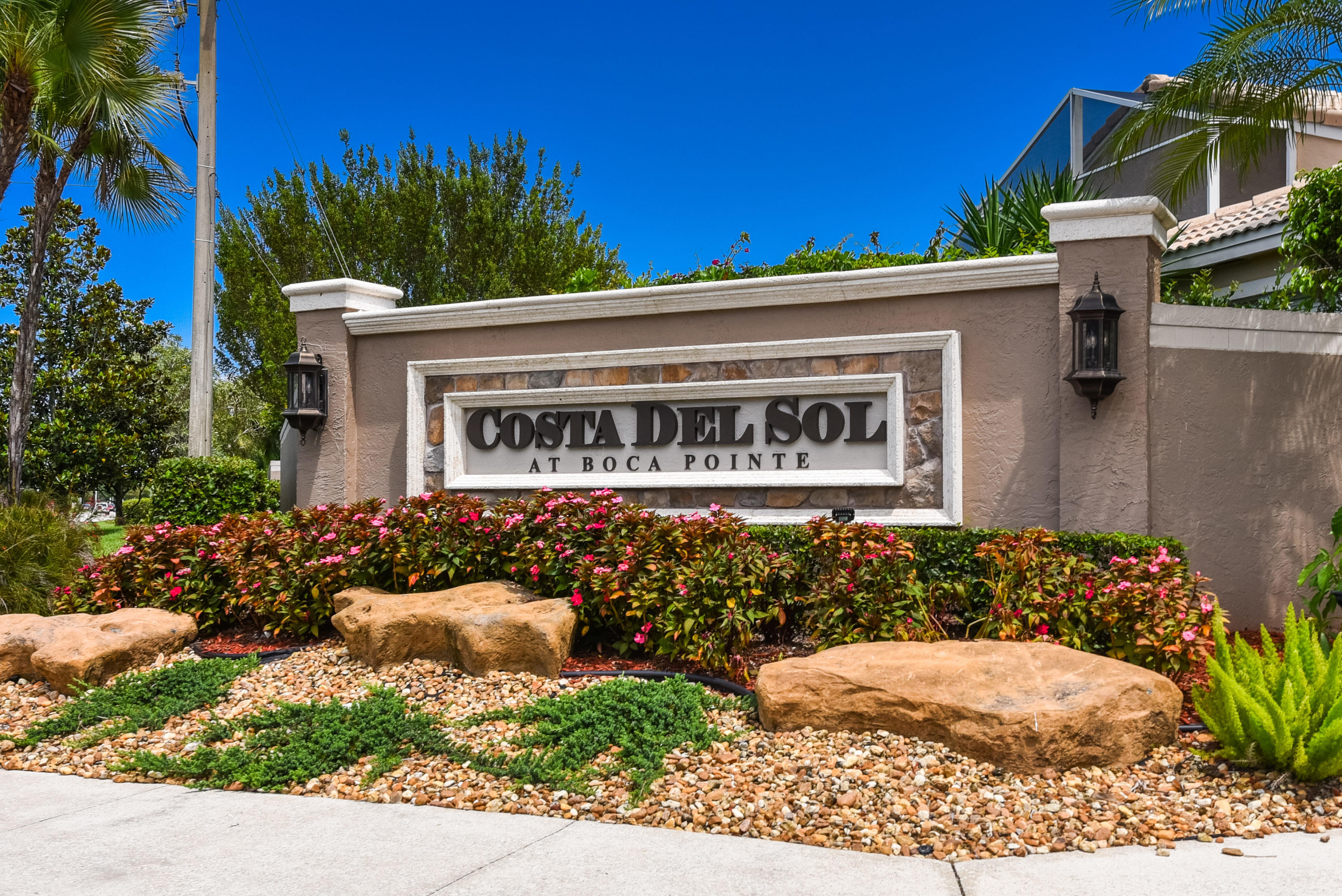 23358 Torre Circle Boca Raton, FL 33433 - Photo 34 of 34 a front view of a house with garden