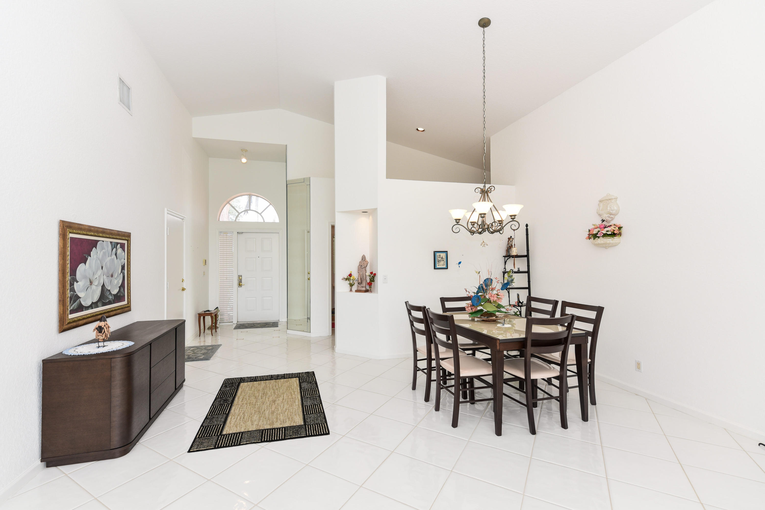 23358 Torre Circle Boca Raton, FL 33433 - Photo 7 of 34 a view of a dining room with furniture