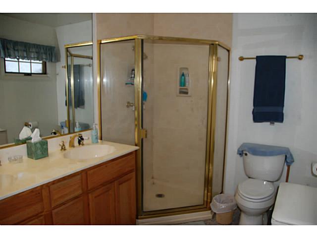 520 Amigos Road Ramona, CA 92065 - Photo 11 of 17 Master Bath has walk-in shower & double sinks. Tiled floor.
