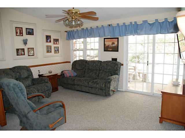 520 Amigos Road Ramona, CA 92065 - Photo 7 of 17 Sliding glass door leads to patio, pool, spa & fenced side yard area.