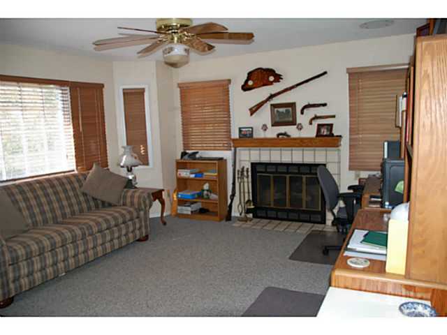 520 Amigos Road Ramona, CA 92065 - Photo 9 of 17 Located through double doors off entry. Fireplace has gas log. Being used as an office.