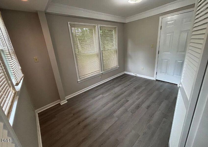 524 Boone Road Eden, NC 27288 - Photo 9 of 12 an empty room with wooden floor and windows