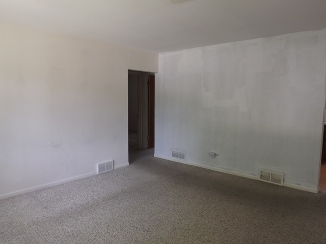 2411 West Cheyenne Road Waukegan, IL 60087 - Photo 6 of 18 a view of an empty room