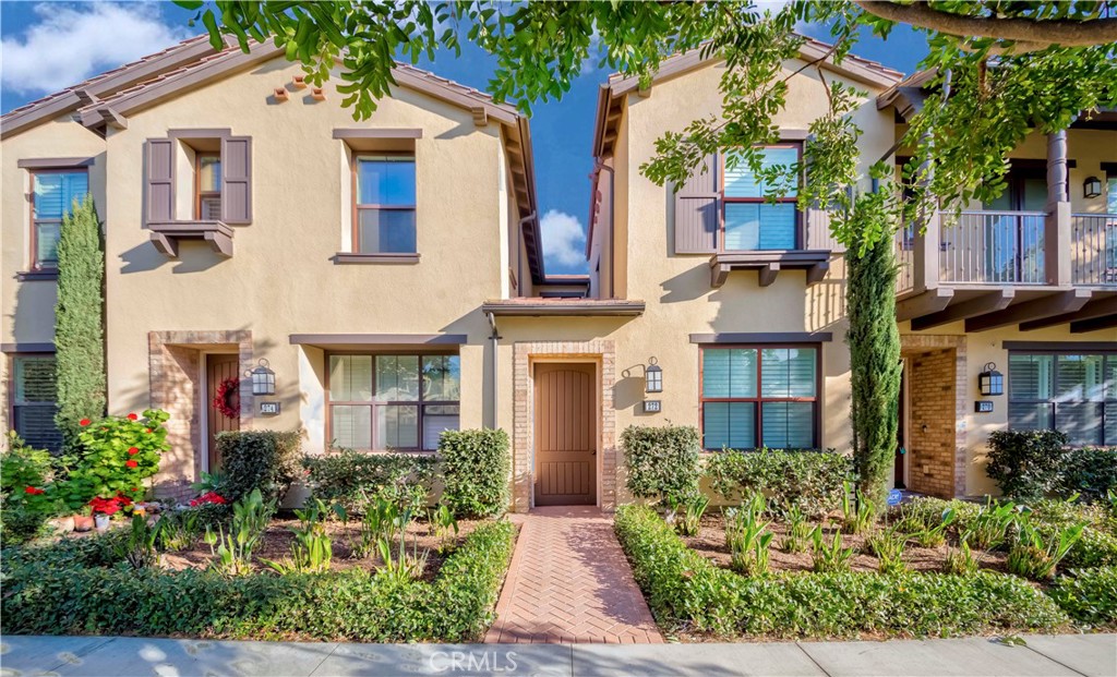 272 Rodeo Irvine, CA 92602 - Photo 1 of 1 front view of a brick house with a yard