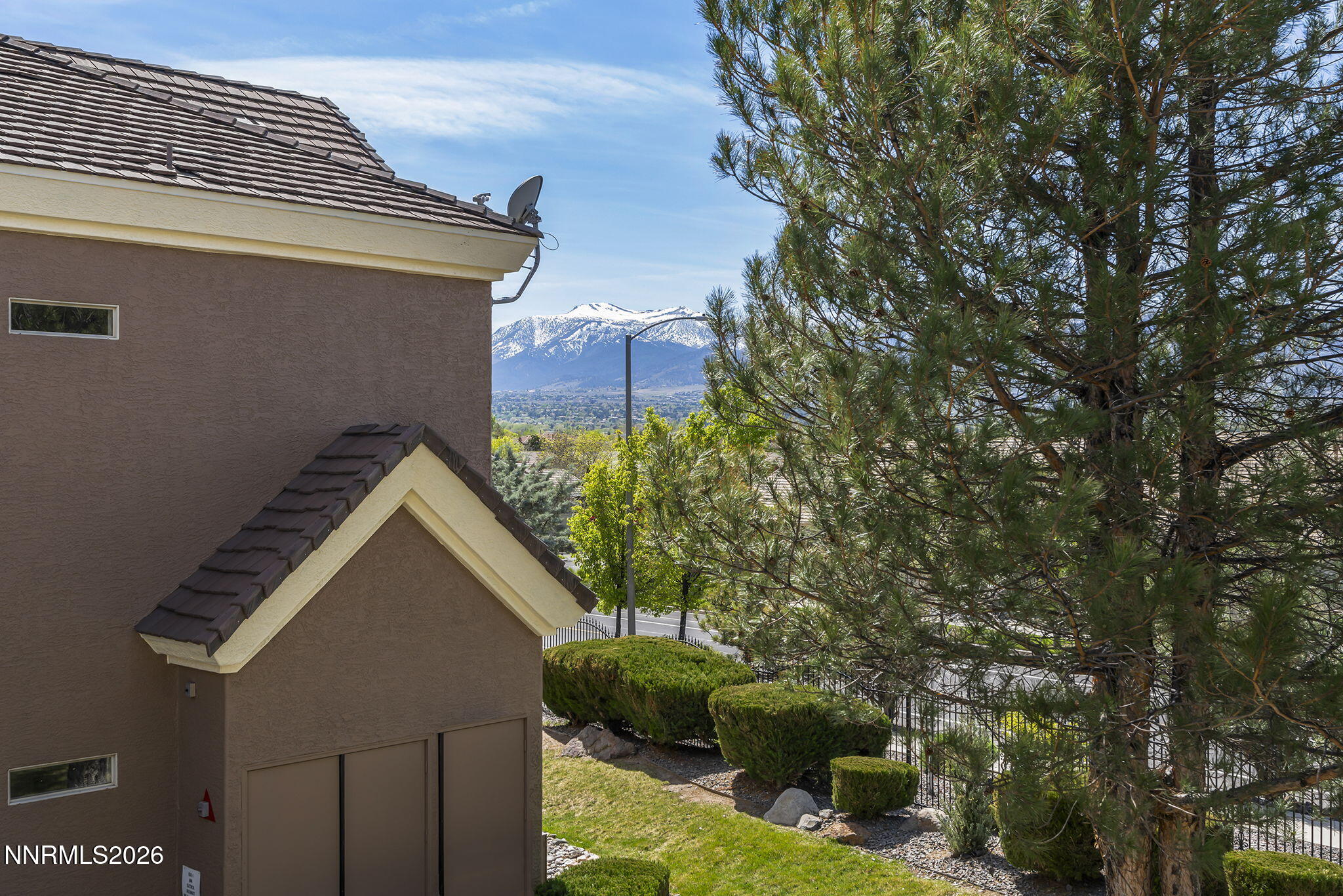 9900 Wilbur May Parkway, Unit 304 Reno, NV 89521 - Photo 31 of 47 a view of backyard of house