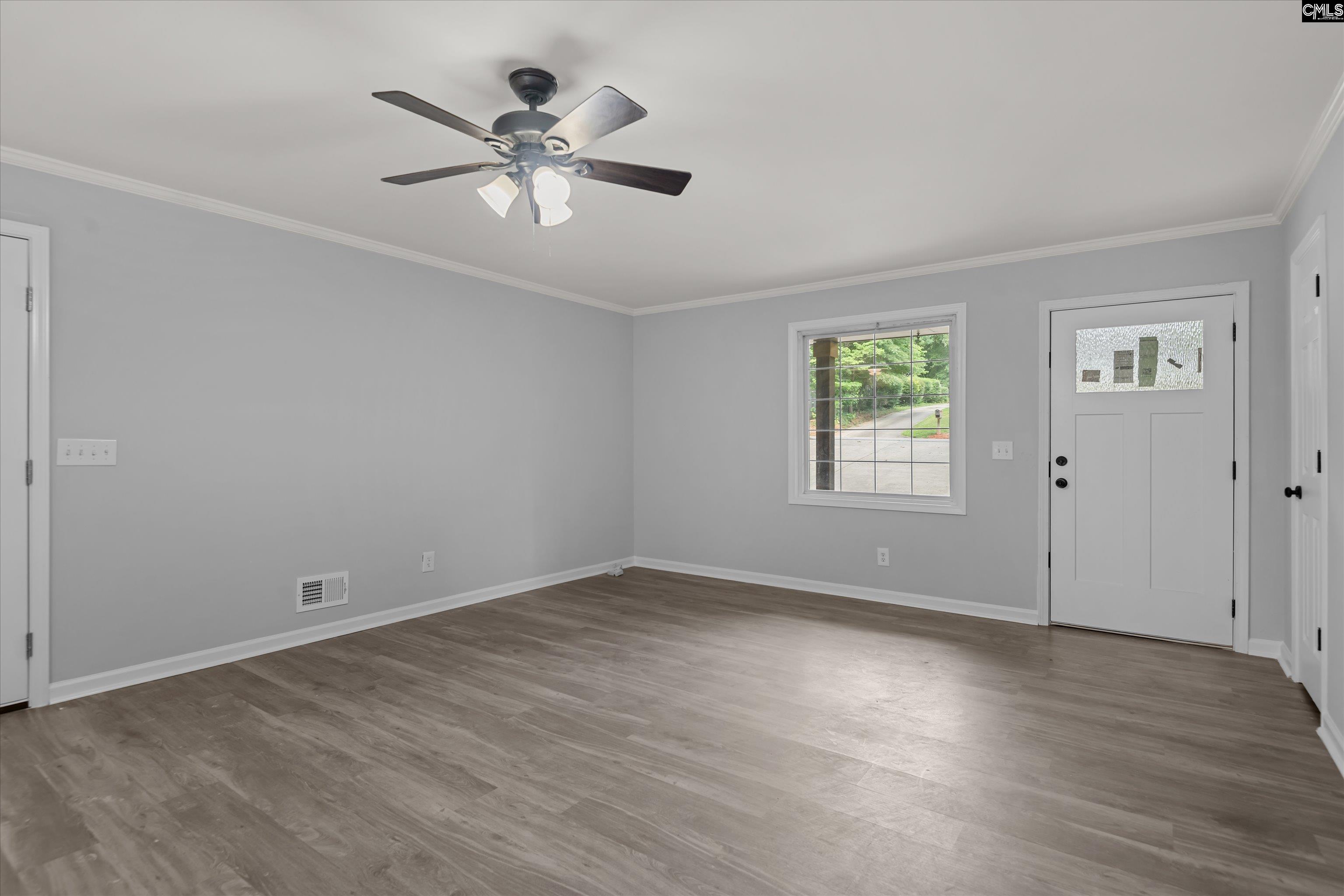 245 Piney Grove Road Columbia, SC 29210 - Photo 5 of 29 wooden floor in an empty room with a window