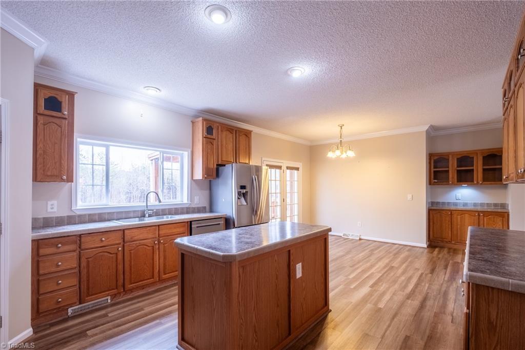 485 Amos Road Madison, NC 27025 - Photo 14 of 37 Large working kitchen with center island