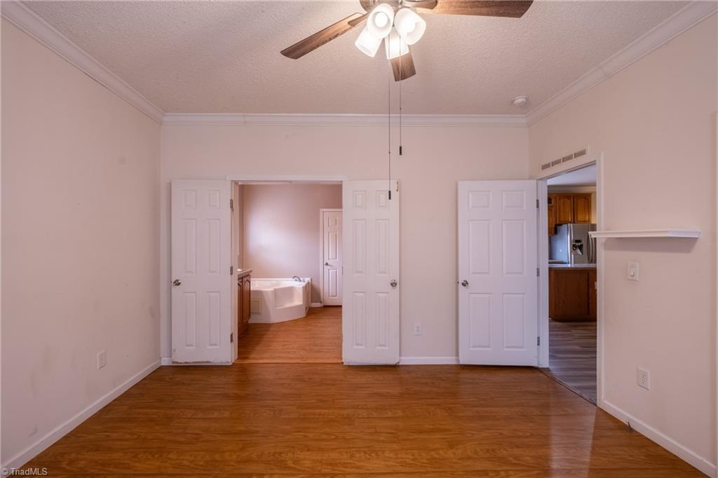 485 Amos Road Madison, NC 27025 - Photo 18 of 37 View of Primary and en suite bath