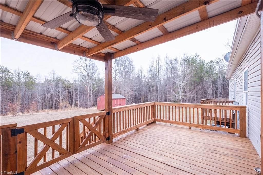 485 Amos Road Madison, NC 27025 - Photo 32 of 37 Covered porch at rear and deck