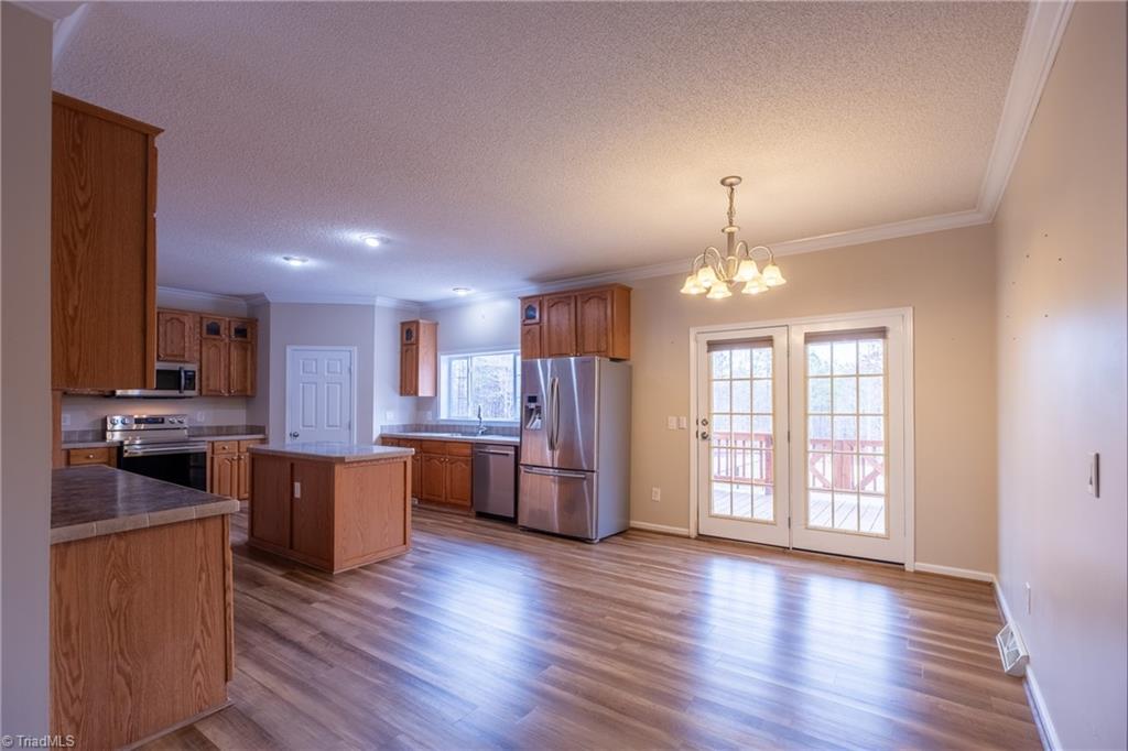 485 Amos Road Madison, NC 27025 - Photo 10 of 37 View from dining into large kitchen