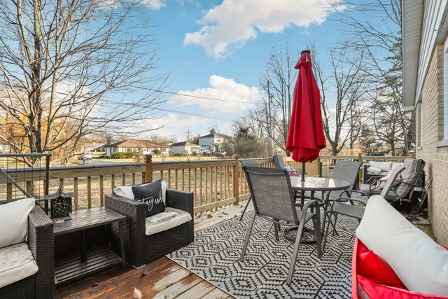 a view of roof deck with patio