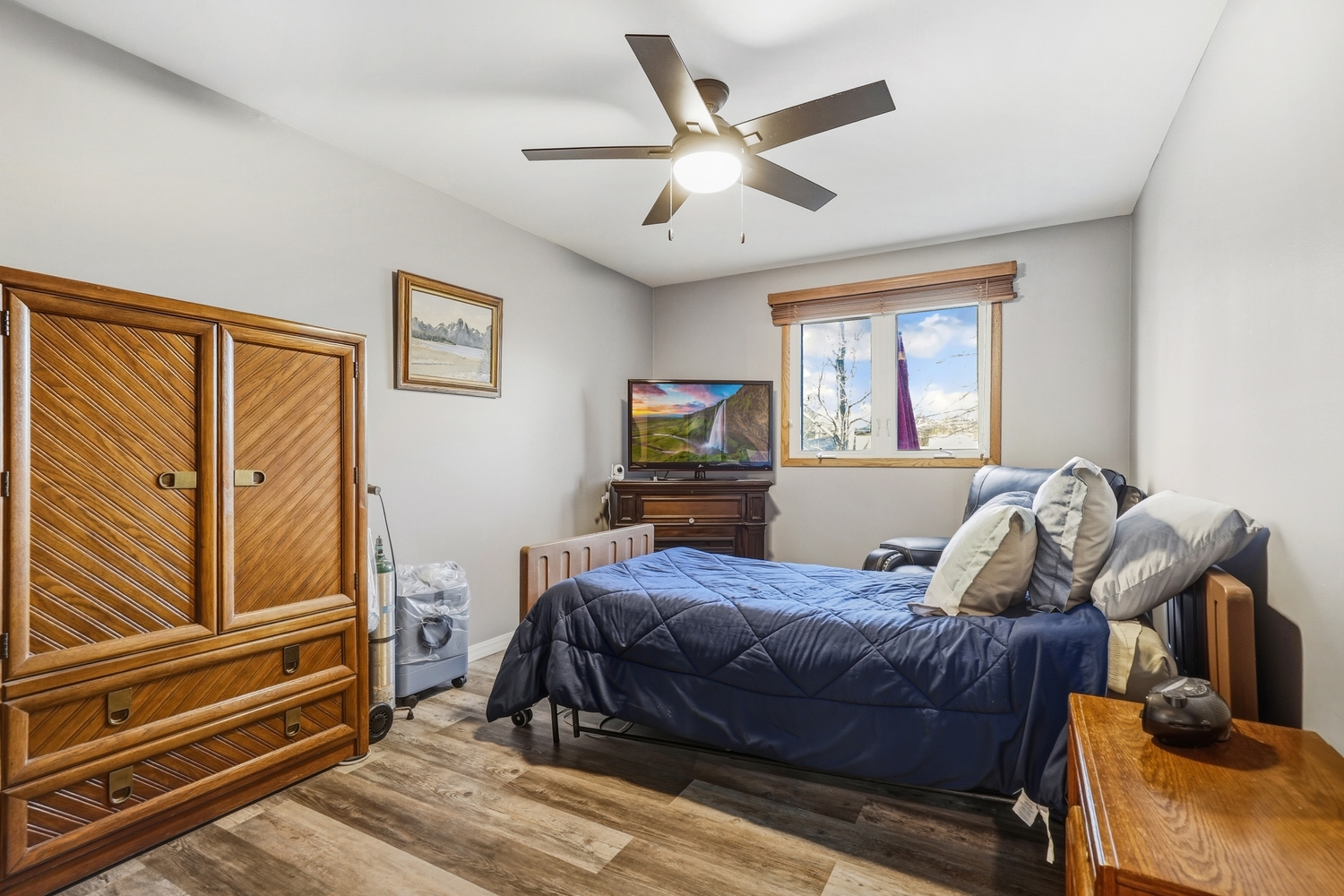 11S450 Carpenter Street Lemont, IL 60439 - Photo 8 of 29 a bedroom with a bed and wooden floor